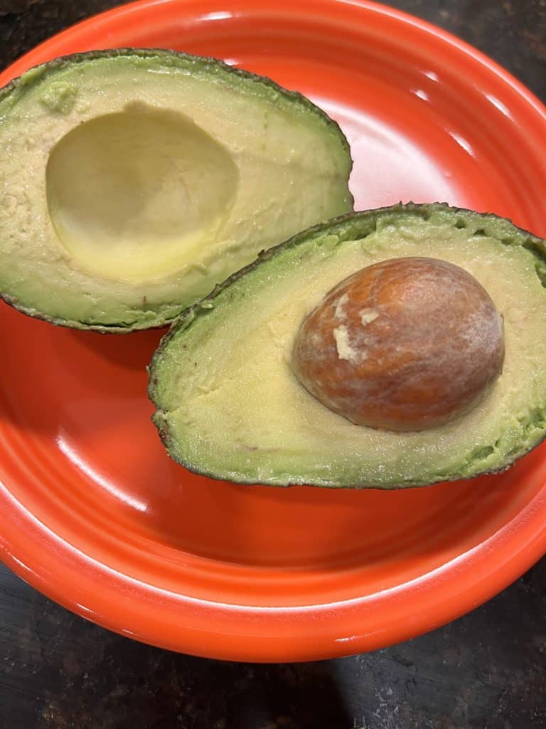 Close up of sliced open avocado