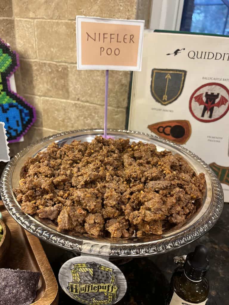 Ground beef labeled with harry potter decorations in background
