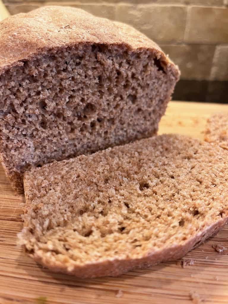 close up of sliced homemade wheat bread