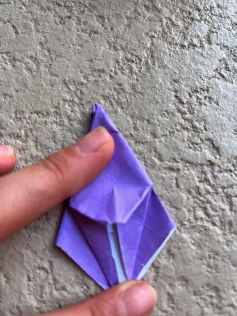 folding down the point of the frog base
