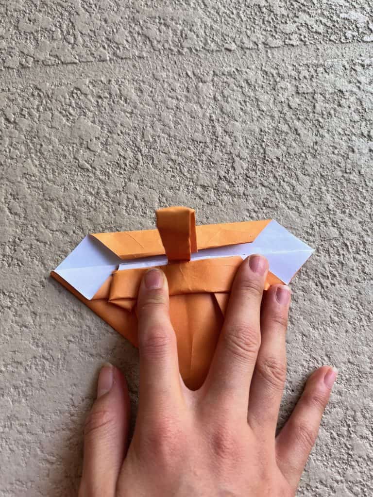 folding the rim of the basket
